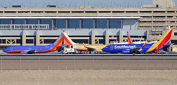 Southwest Boeing 737-3G7 N670SW, 737-7H4 N711HK, and 737-790 N560WN, Phoenix Sky Harbor, December 22, 2014